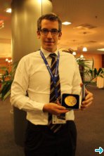 Christian Rügg with his prize Christian Rügg with his prize